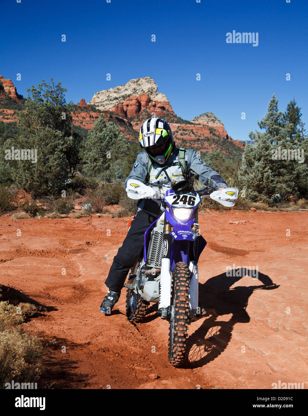 Visitor on duals-sport dirt bike explores Soldier Pass area in Sedona Stock Photo