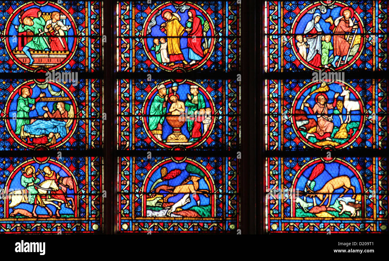 Colorful stained glass window in Cathedral Notre Dame de Paris Stock Photo