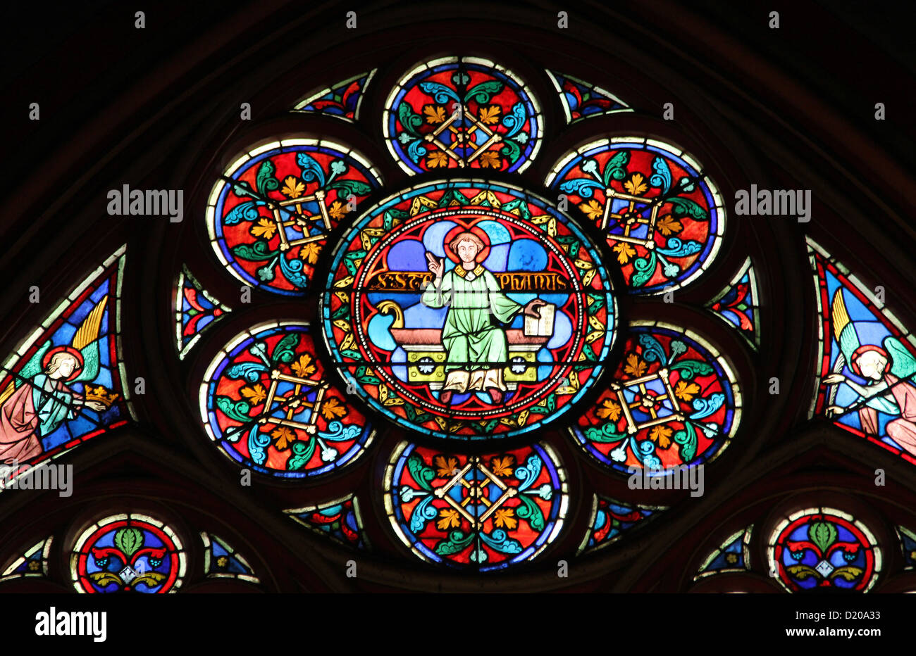 Colorful stained glass window in Cathedral Notre Dame de Paris Stock