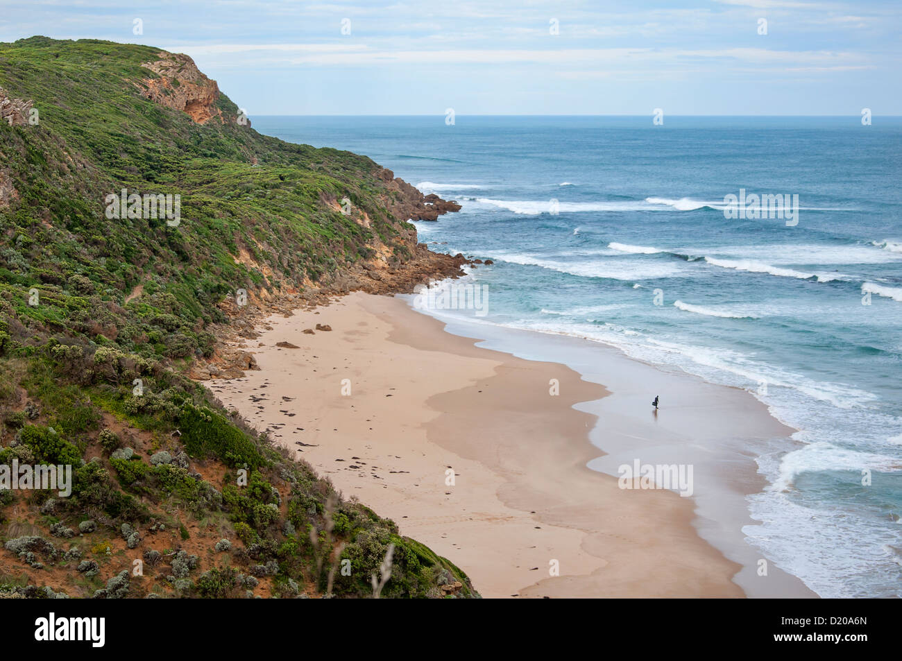 A Lone Surfer at Glenaire, Victoria, Australia Stock Photo