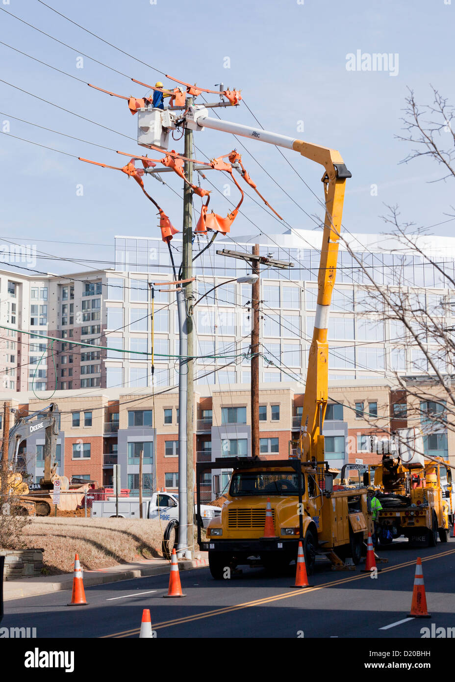 Lineman working on electric line USA Stock Photo Alamy