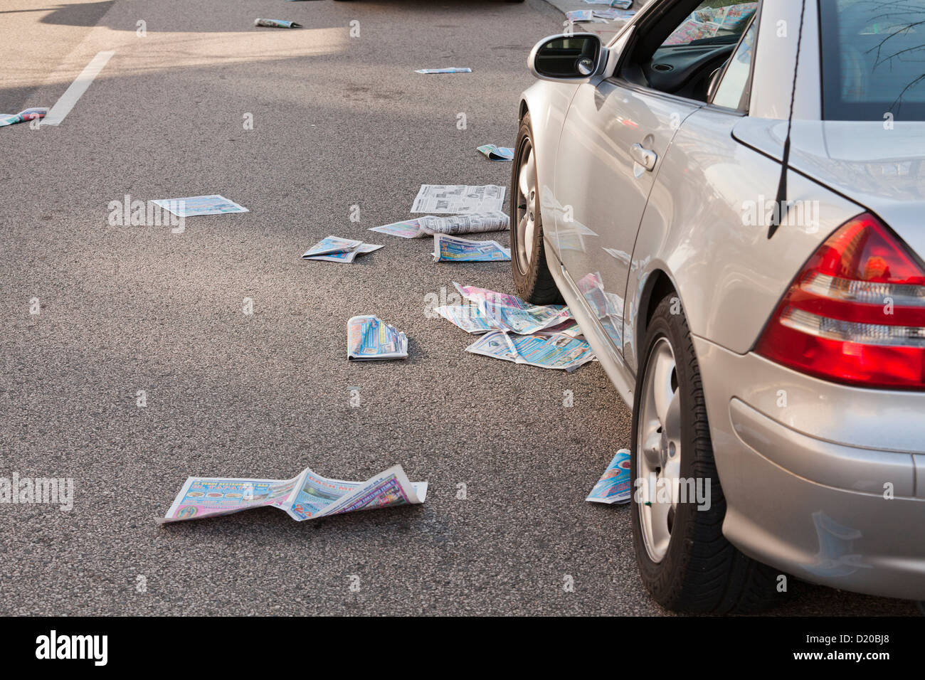Newspapers littered on street - USA Stock Photo