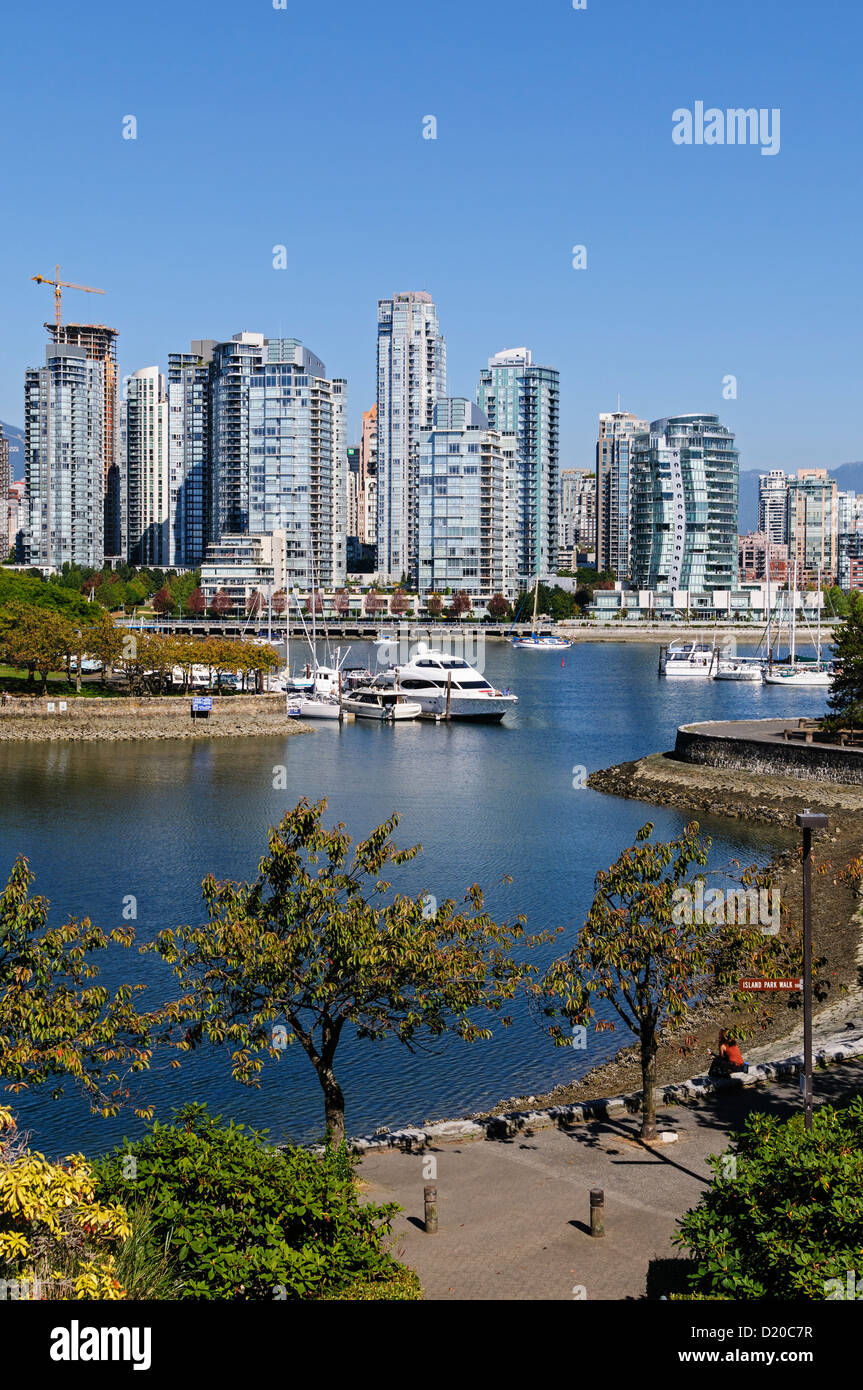A scenic view from the south side of Vancouver's False Creek waterway looking towards the city center and Yaletown area Stock Photo
