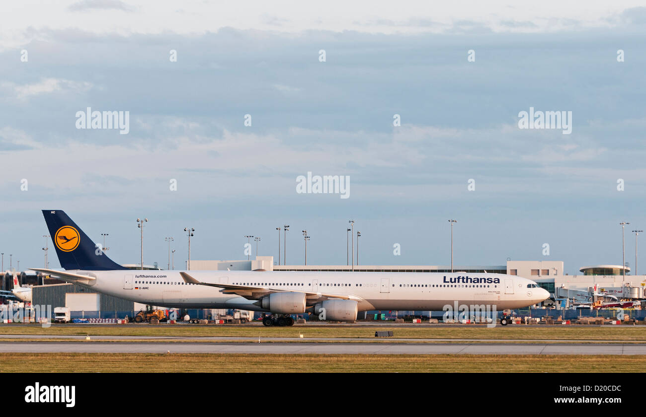 A Lufthansa Airbus A340-600 jetliner taxies along the tarmac at Vancouver International Airport. Stock Photo