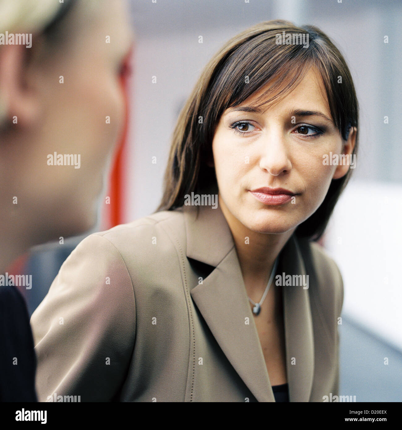 Businesswoman talking in office License free except ads and billboards Stock Photo