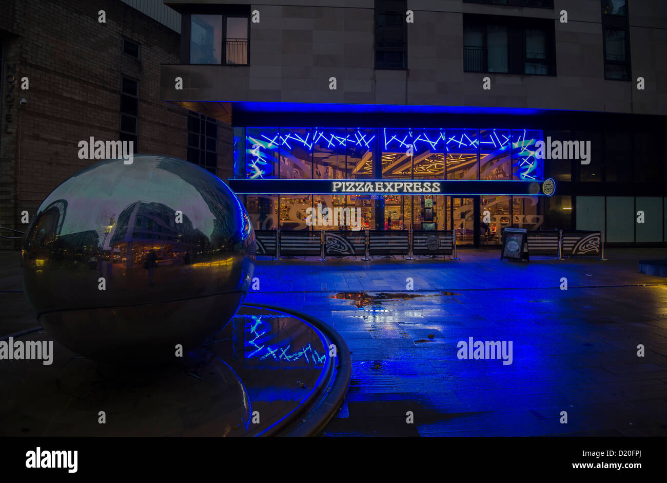 Sheffield  South Yorkshire Pizza Express  restaurant  lit up with neon lights 2012 Stock Photo