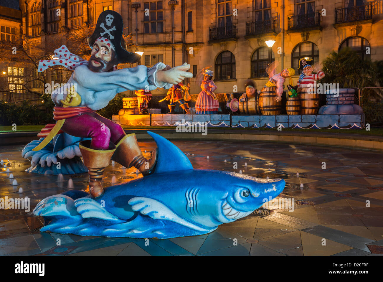 Sheffield  town hall and Peace  Gardens lit up for Christmas 2012 with illuminated figures and lights on display South Yorkshire Stock Photo