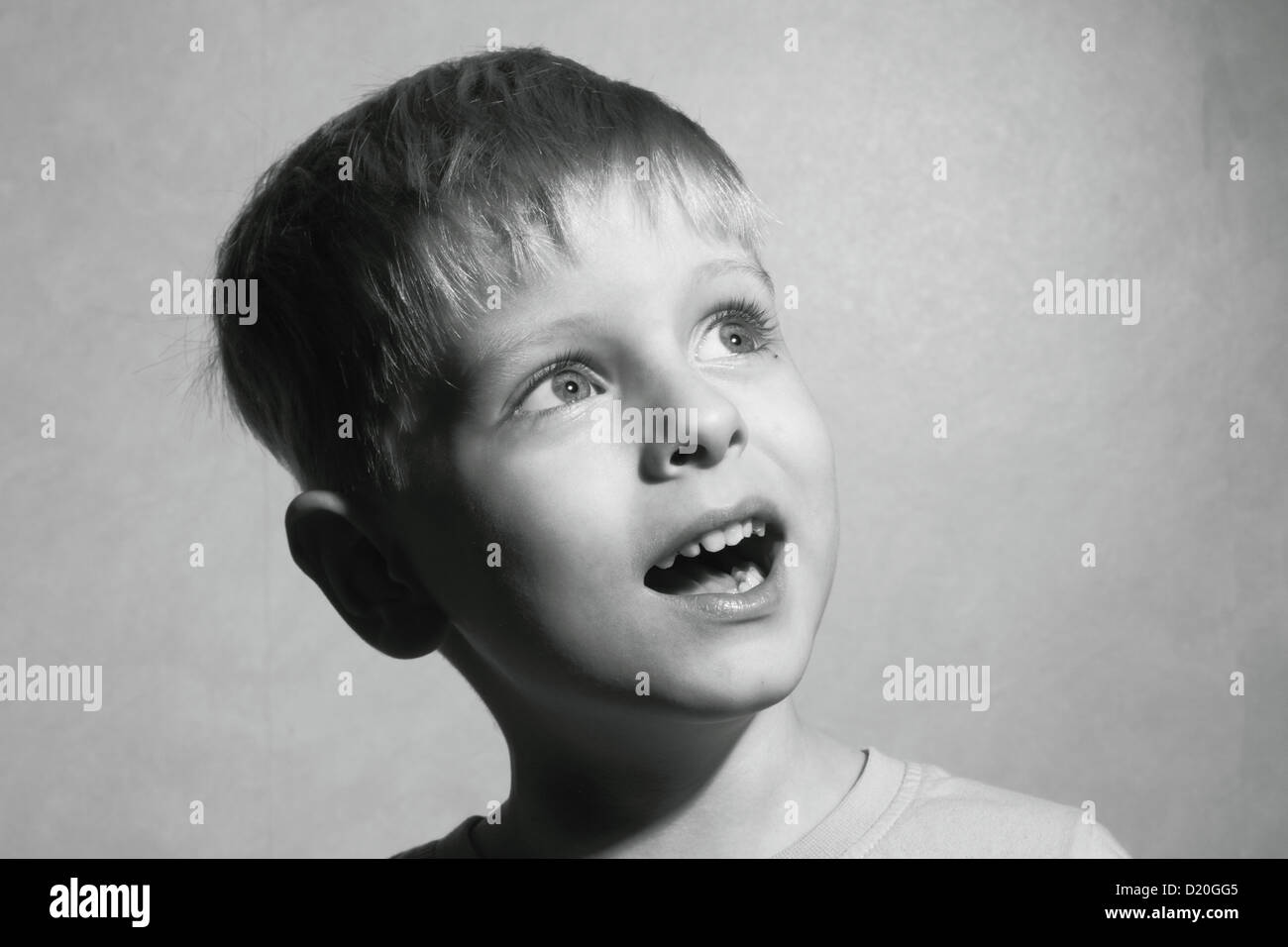 portrait of little boy look up Stock Photo Alamy