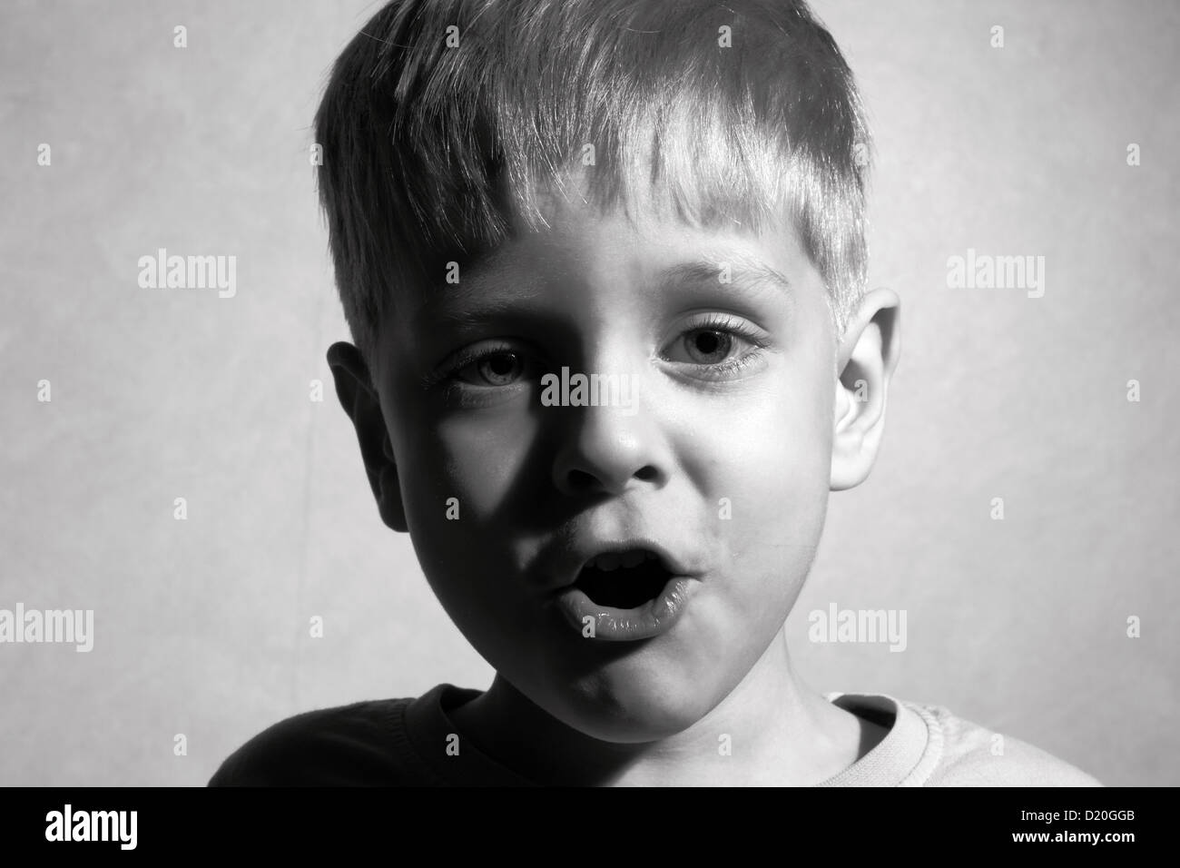 Singing little boy Stock Photo