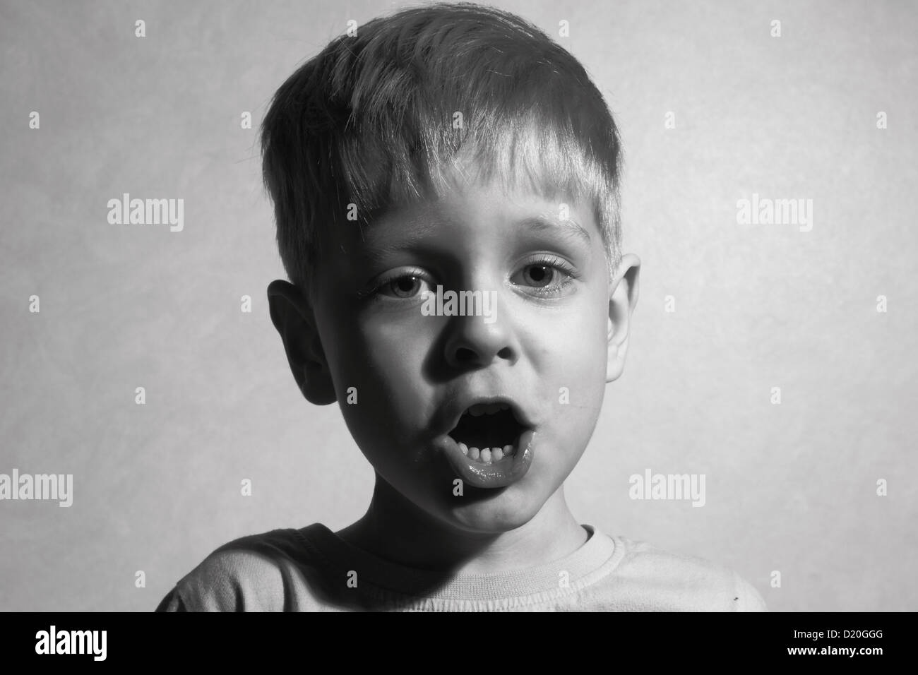 Singing little boy Stock Photo
