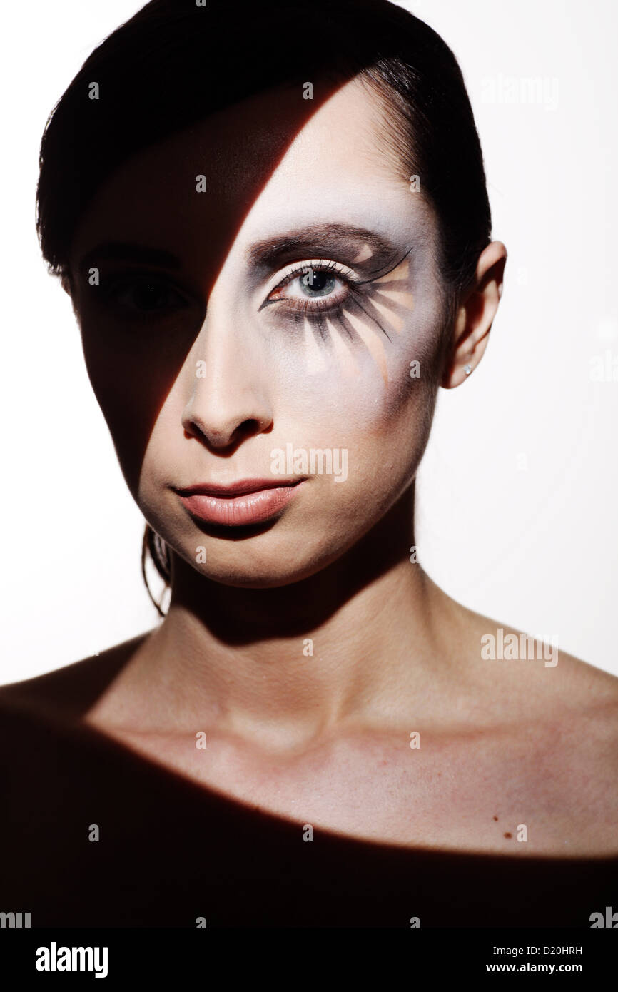 Woman, 24, with striking eye makeup Stock Photo