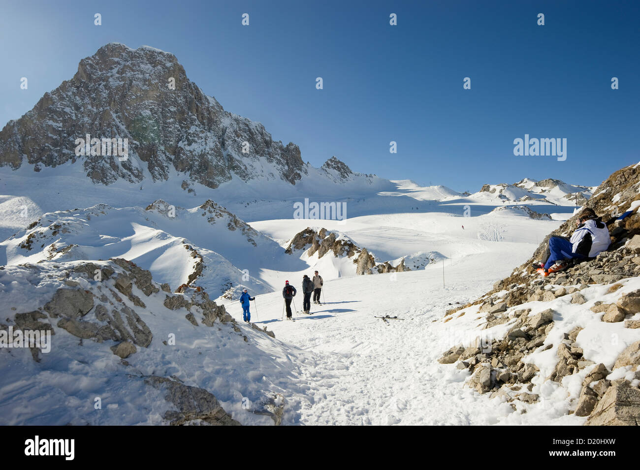 Skiers, Snow-capped mountains, Tignes, Val d Isere, Savoie department, Rhone-Alpes, France Stock Photo