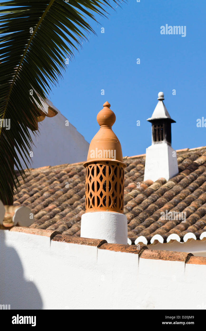 Chimneys on cottage, icon of the Algarve, Portugal, Europe Stock Photo