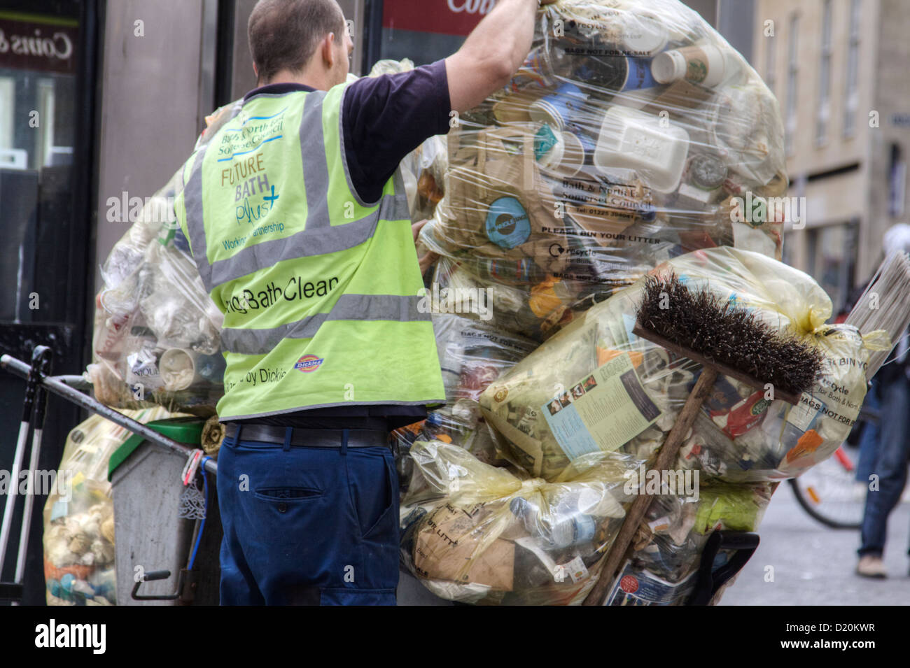 Large bags full of rubbish gathered by the refuse collector keeping the