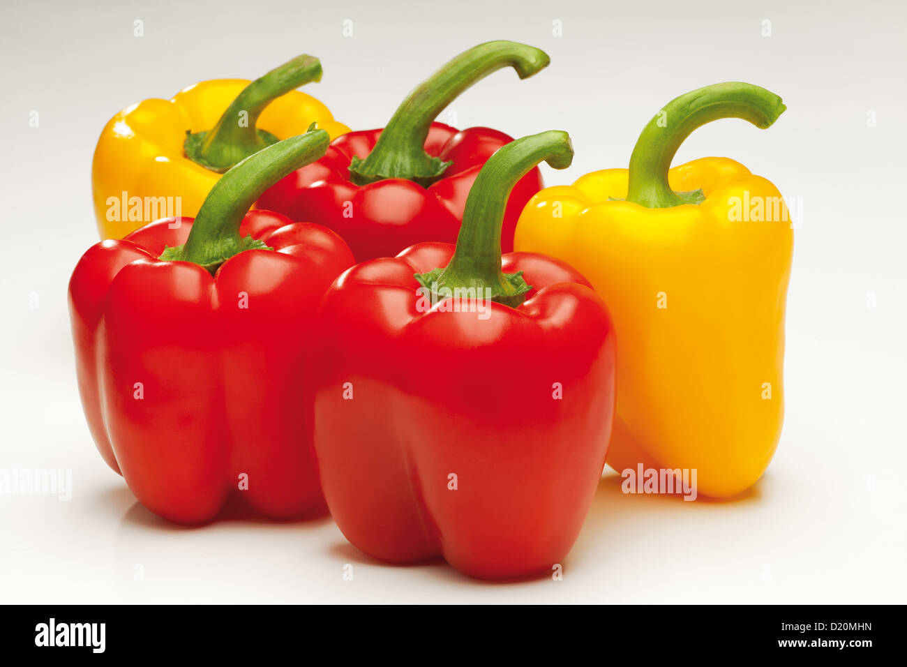 sweet red and yellow pepper on white background Stock Photo - Alamy