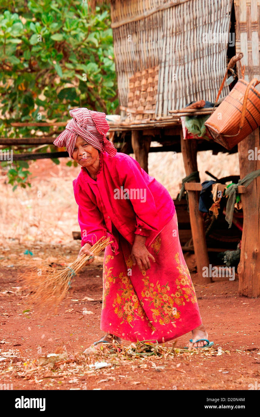 A traditional tribeswoman at a Tompuon minority village in Ratanakiri province in northern Cambodia, Indochina, Asia. Stock Photo