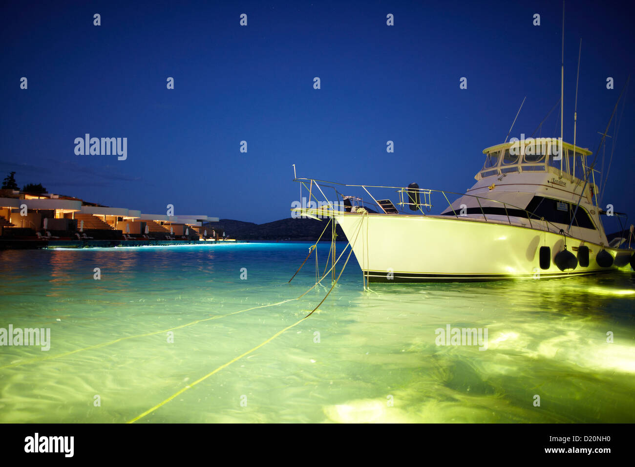 Yacht at night, Elounda, Agios Nikolaos, Crete, Greece Stock Photo