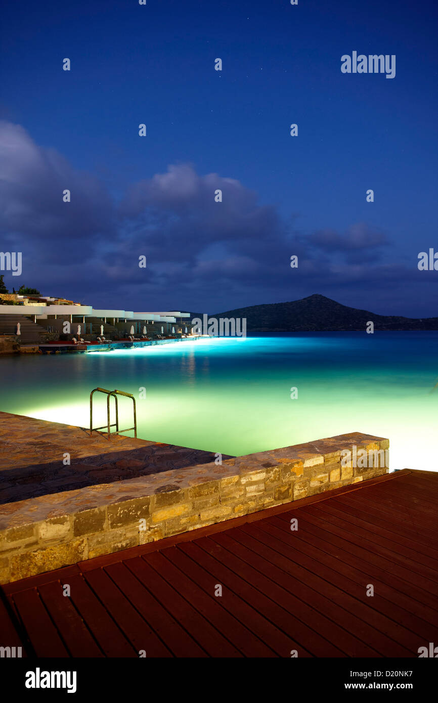 Hotel terraces at sea, Elounda, Agios Nikolaos, Crete, Greece Stock Photo