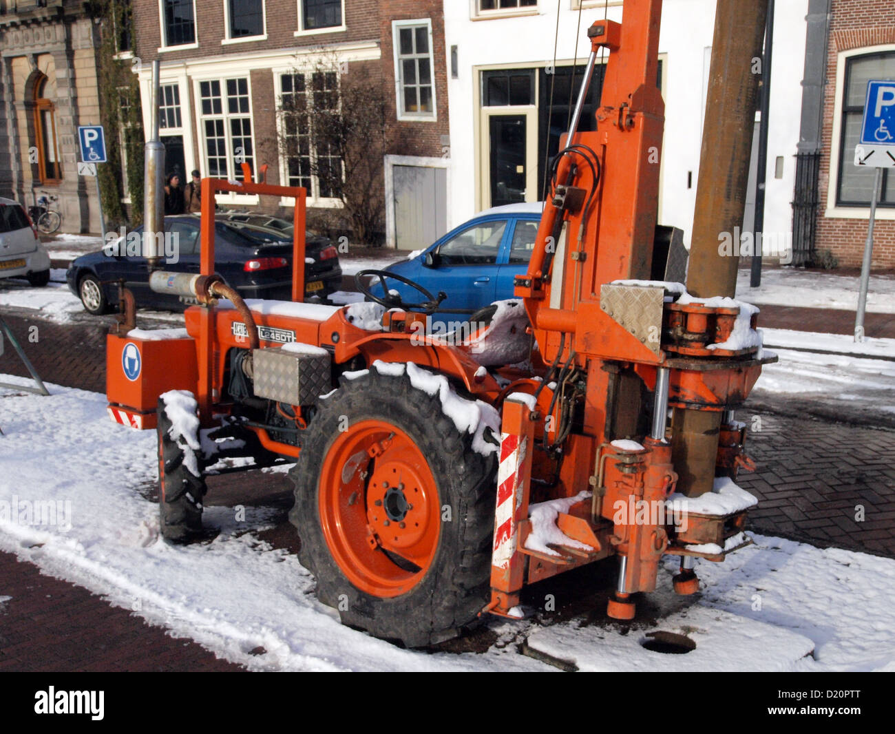 The Kubota L245 is a compact utility tractor designed for farming and ...