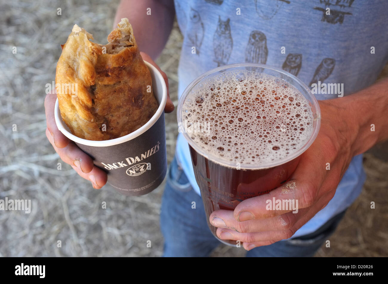 Typical festival food, a pasty and a pint Stock Photo