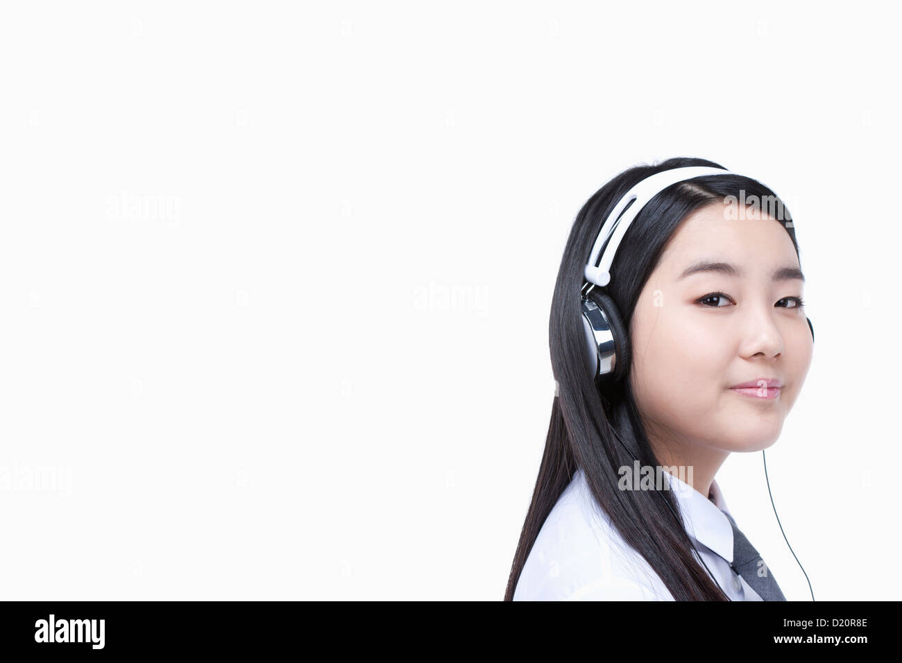 a female student wearing a headphone Stock Photo
