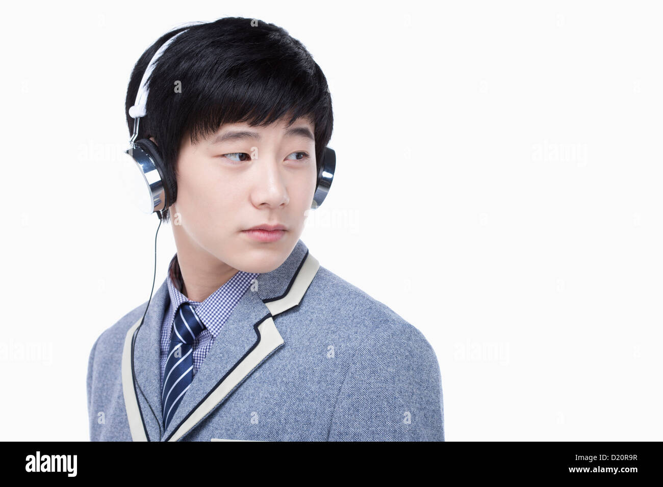 a male student wearing a headphone Stock Photo