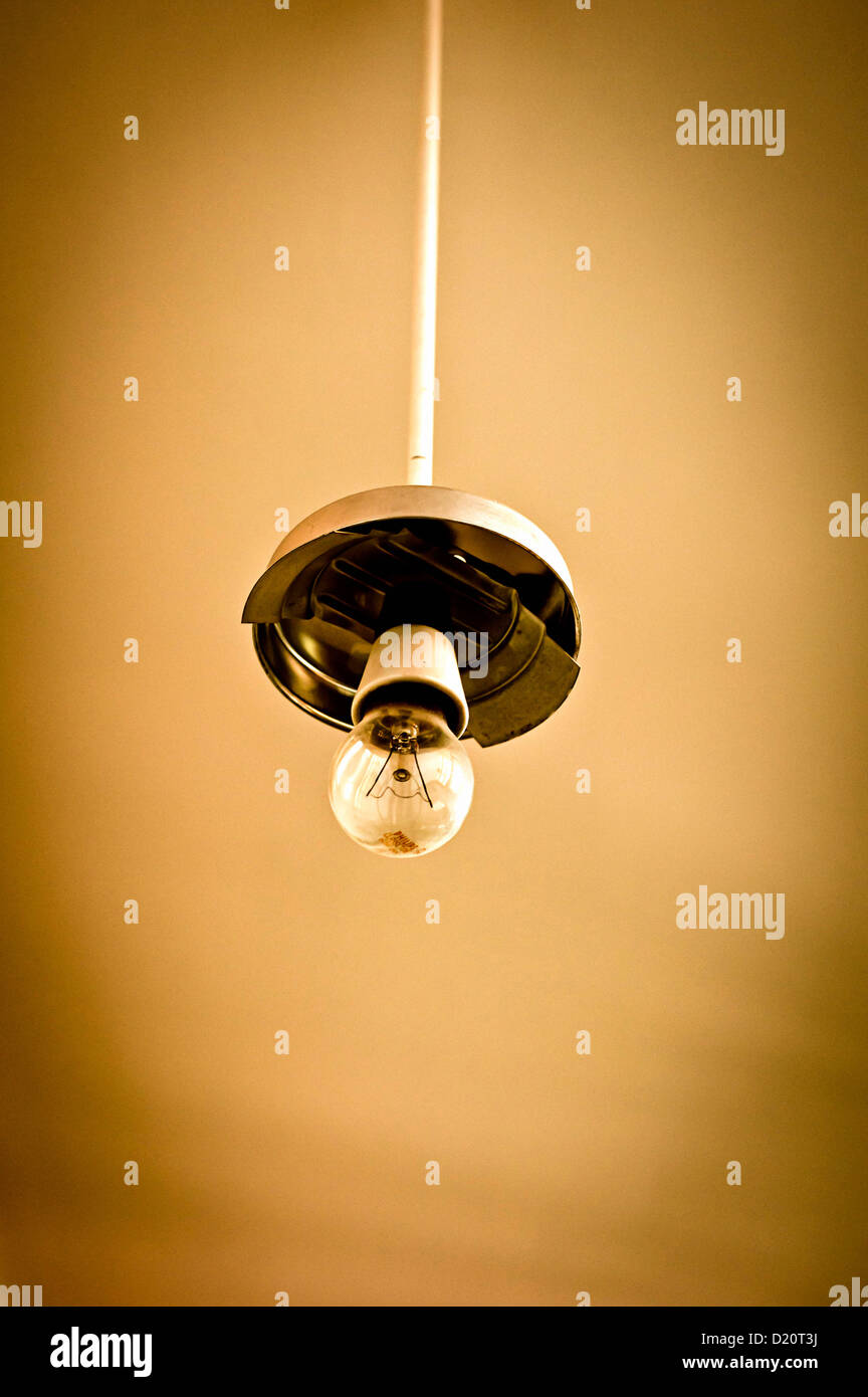 Bare Light Bulb Hanging From A Ceiling Stock Photo 52879334 Alamy