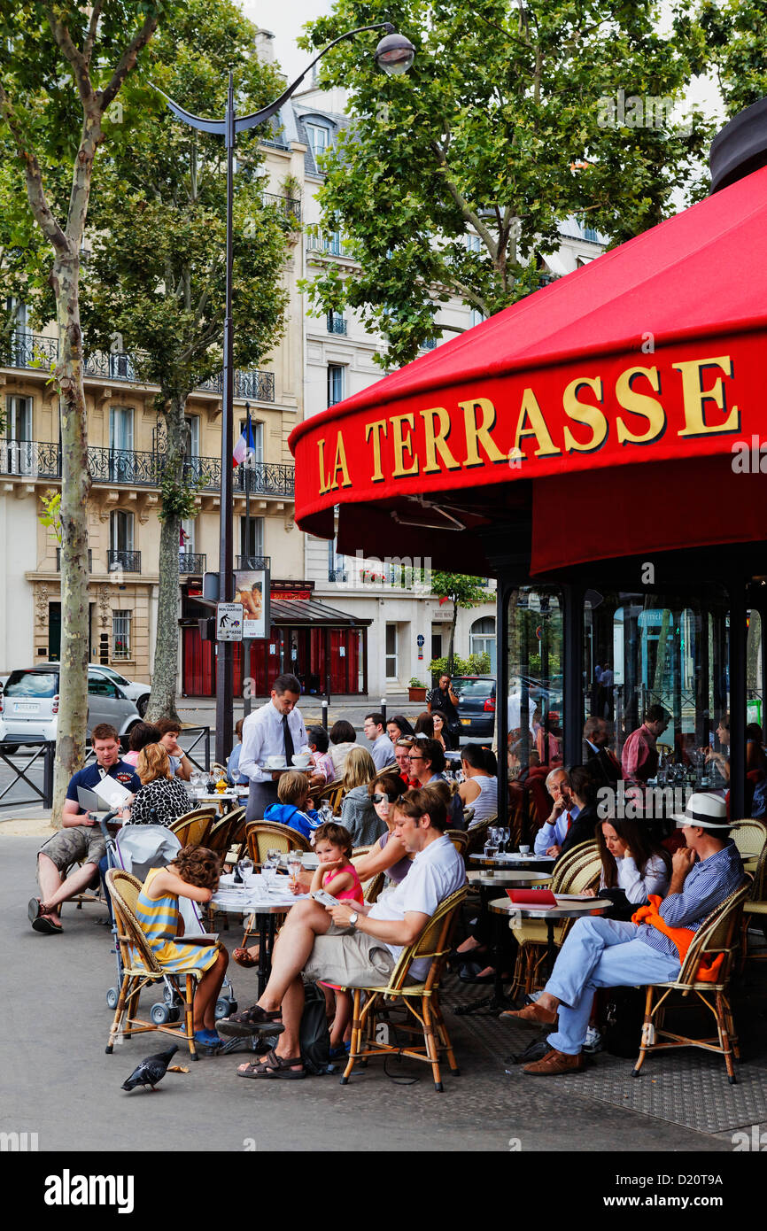 People at the Cafe La Terrasse, Place de l'Ecole Militaire, Paris, France, Europe Stock Photo