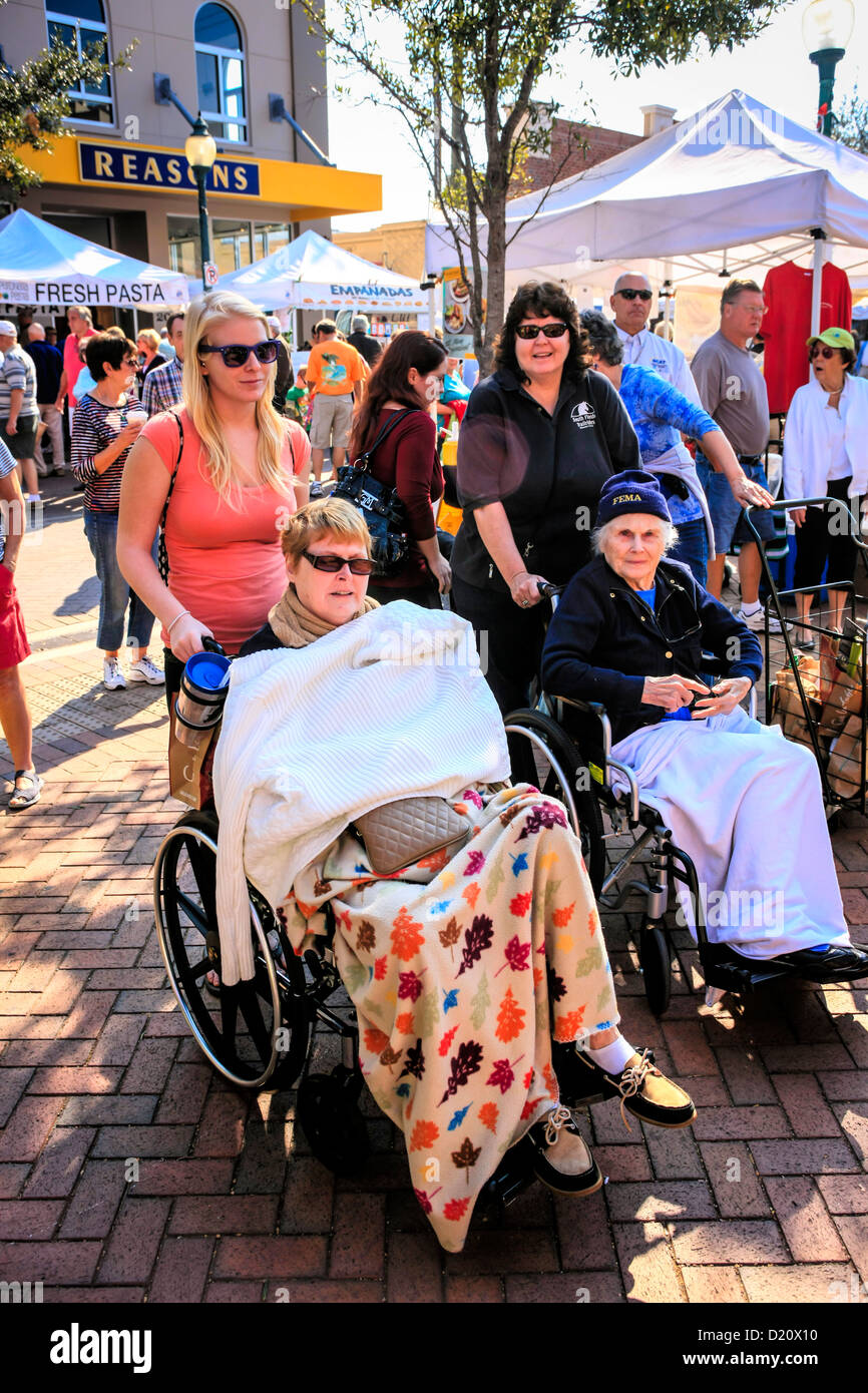 Wheelchair bound handicapped people enjoy a morning at the Sarasota