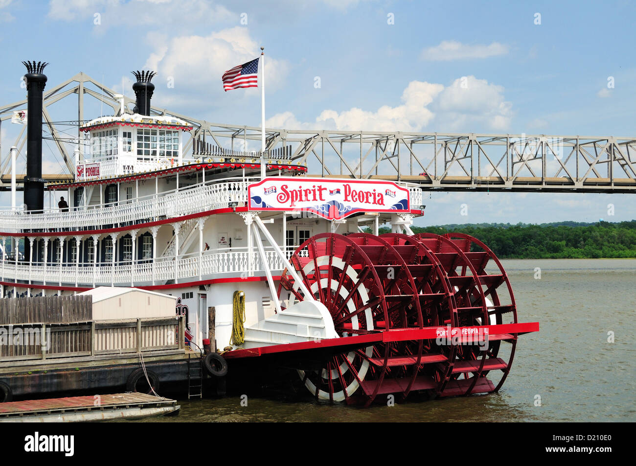 USA Illinois Peoria Spirit of Peoria riverboat anchored riverfront area built 1988 Murray Baker Bridge and Interstate 74. Stock Photo