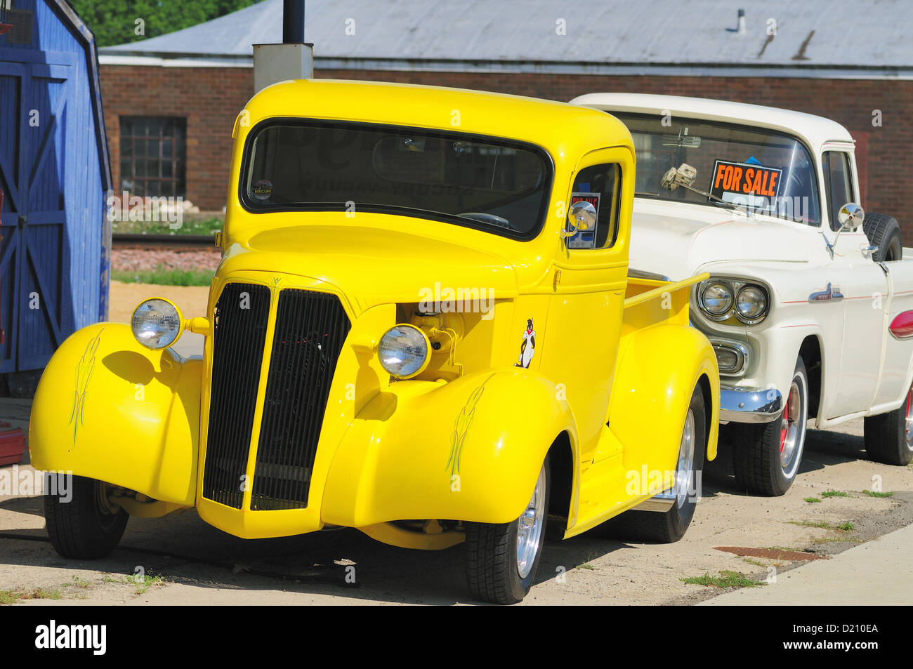 Vintage pickup trucks are on sale in service station in rural Illinois Stock Photo