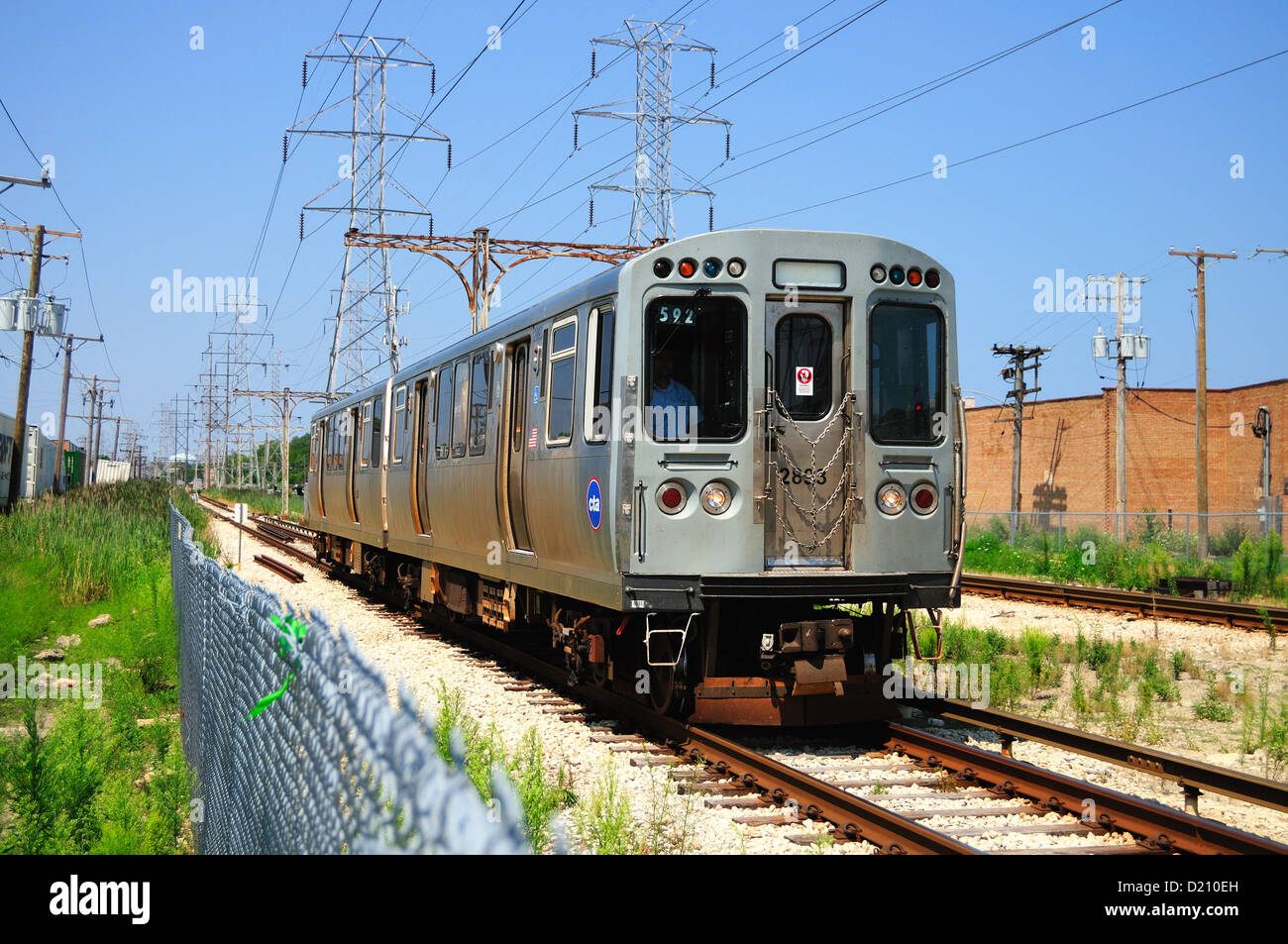 Train CTA Skokie Swift Line) rapid transit train near Oakton Street. Skokie, Illinois, USA. Stock Photo