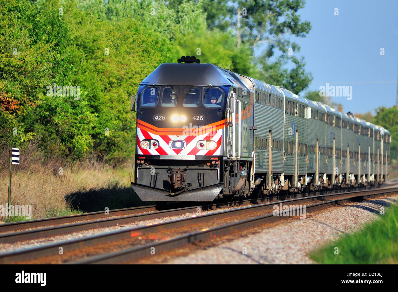 Transportation Metra commuter train in suburban Chicago Bartlett, Illinois, USA. Stock Photo
