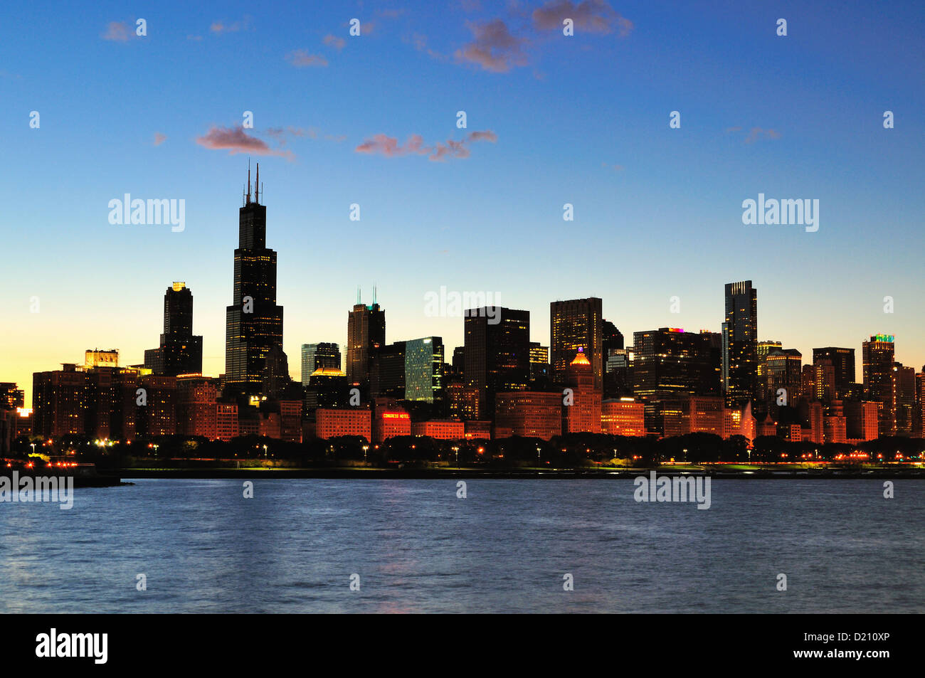 USA Illinois Chicago Loop Willis Tower (formerly Sears Tower) dominating the city skyline at dusk. Stock Photo