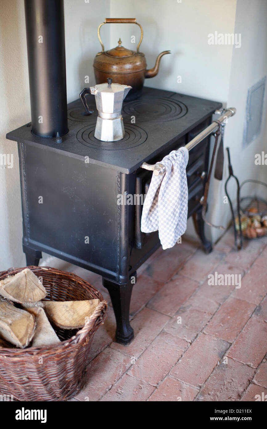 Wood fired stove in a kitchen, Klein Thurow, Roggendorf, Mecklenburg-Western Pomerania, Germany Stock Photo