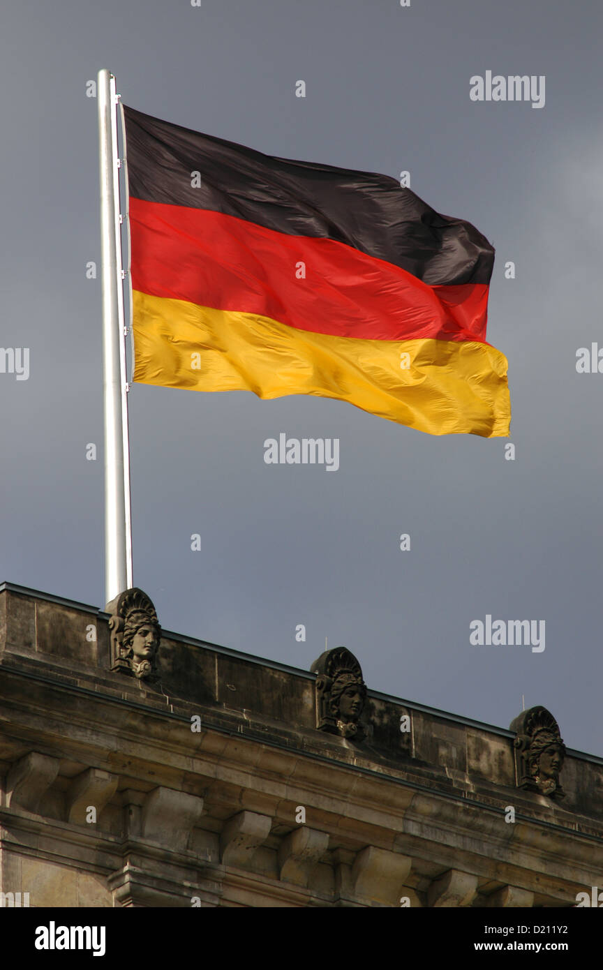 German flag at the German Parliament building (Reichstag). Berlin. Germany. Stock Photo