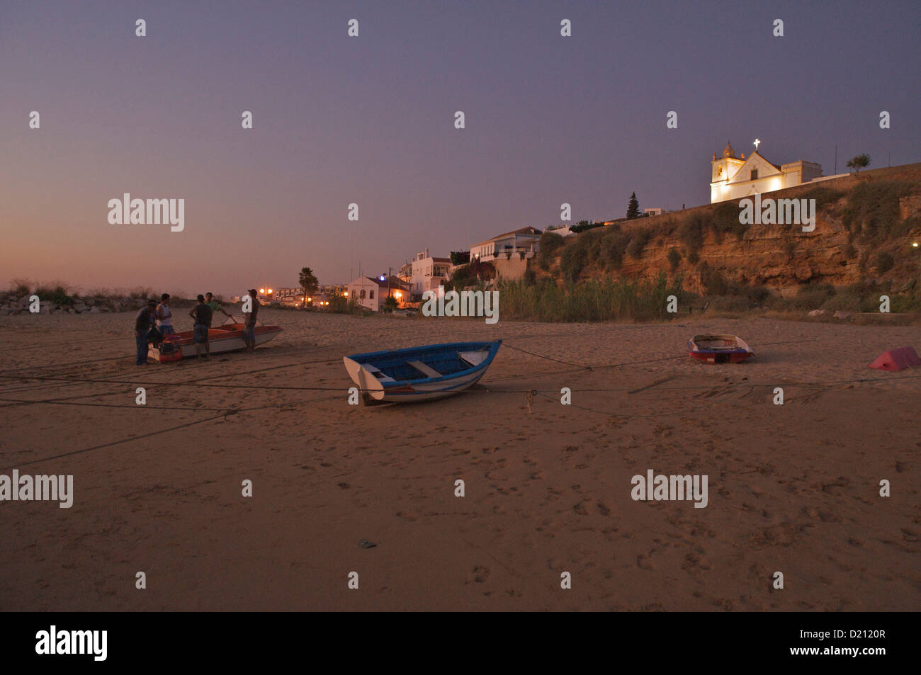 Fisher boat and houses at Arade river, Ferragudo, Central Algarve, Algarve, Portugal, Europe Stock Photo