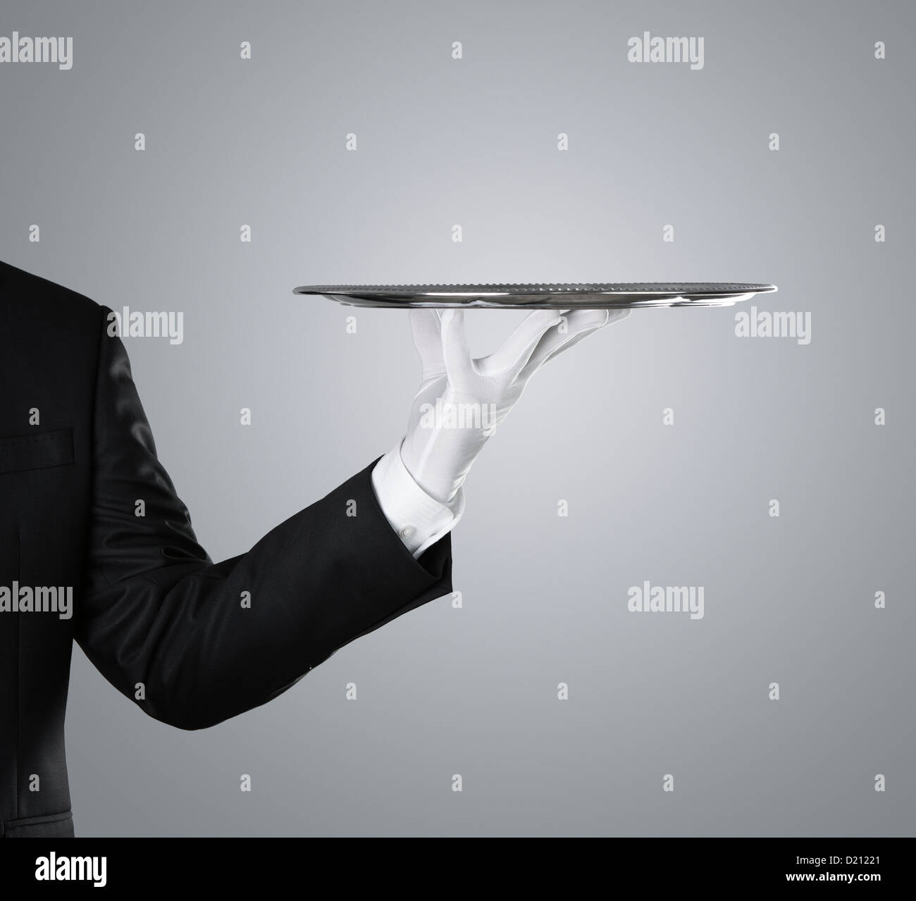 Waiter carrying silver tray hi-res stock photography and images - Alamy