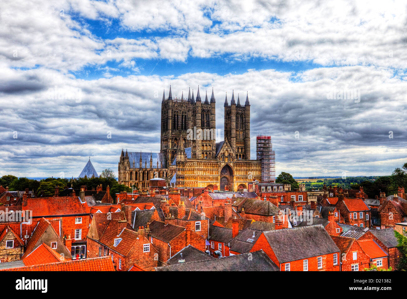 Lincoln city, Lincolnshire red bricks of homes lead to the Cathedral against a dramatic sky from castle walls Stock Photo