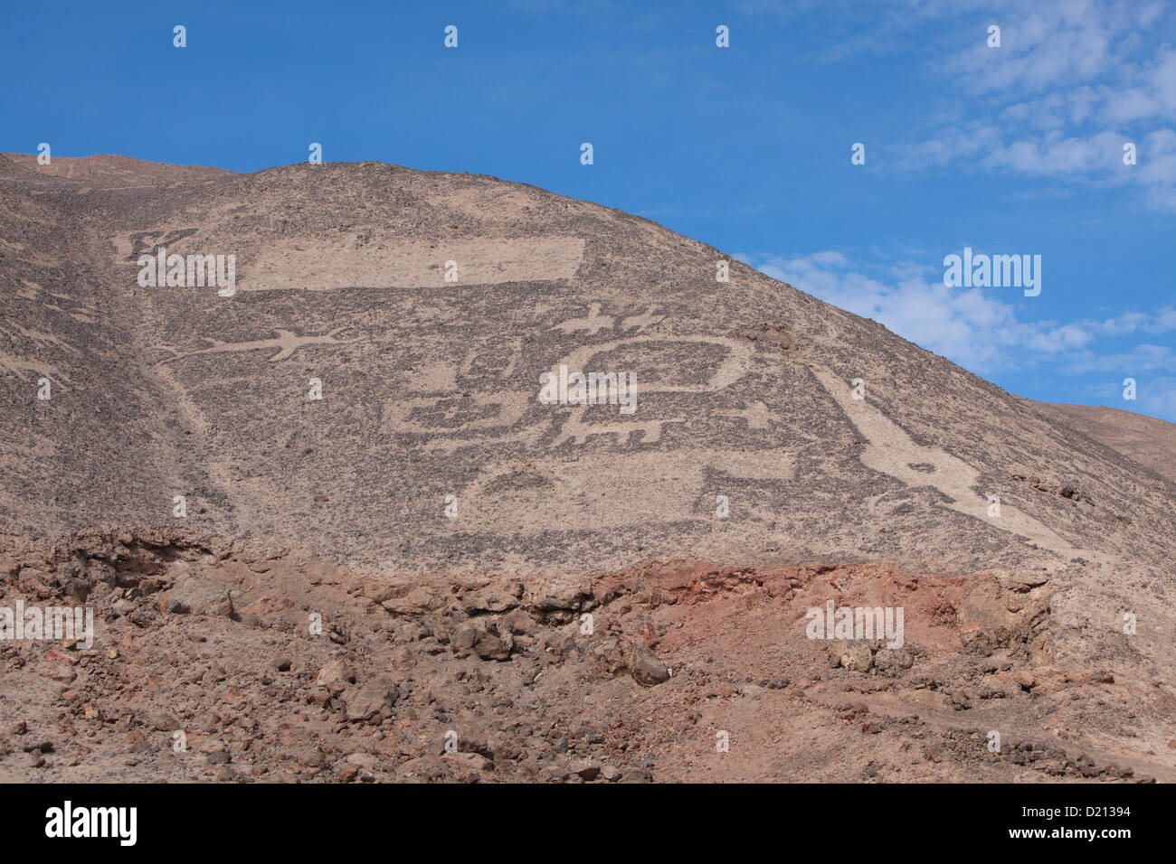 Geoglyphs depicting animal and human figures on hills at Monumento National Geoglifos de Pintados, near Iquique, Tarapaca, Chile Stock Photo