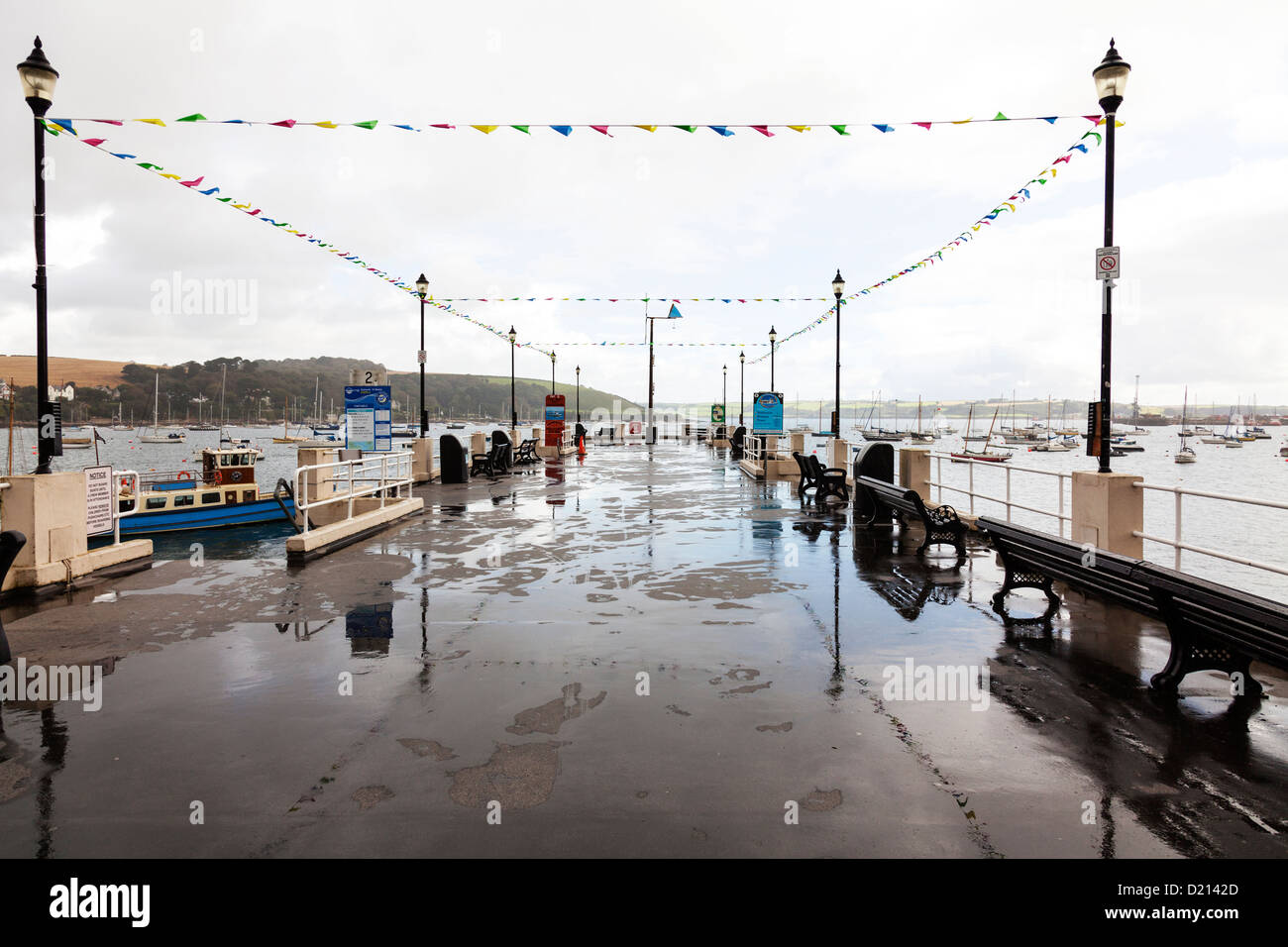 Falmouth, Cornwall UK pier jetty in harbour harbor wet from the rain Stock Photo