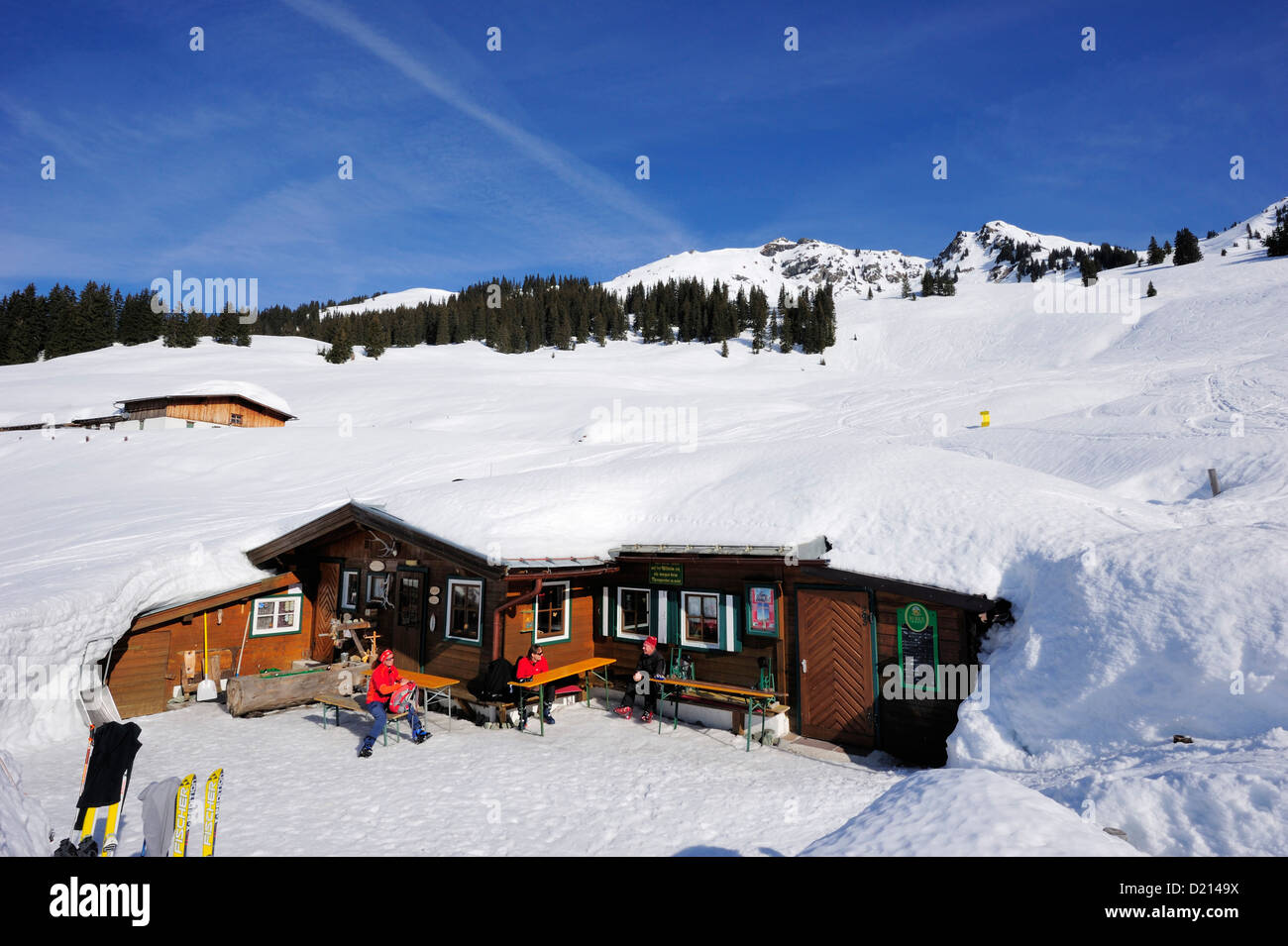 Snow covered alpine hut with Gebra in background, Hochwildalmhuette, Gebra, Kitzbuehel range, Tyrol, Austria, Europe Stock Photo