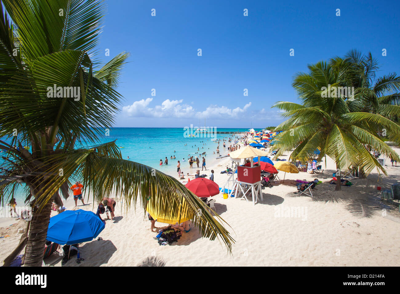 People relaxing and swimming at Doctor's Cave beach, Montego Bay, St