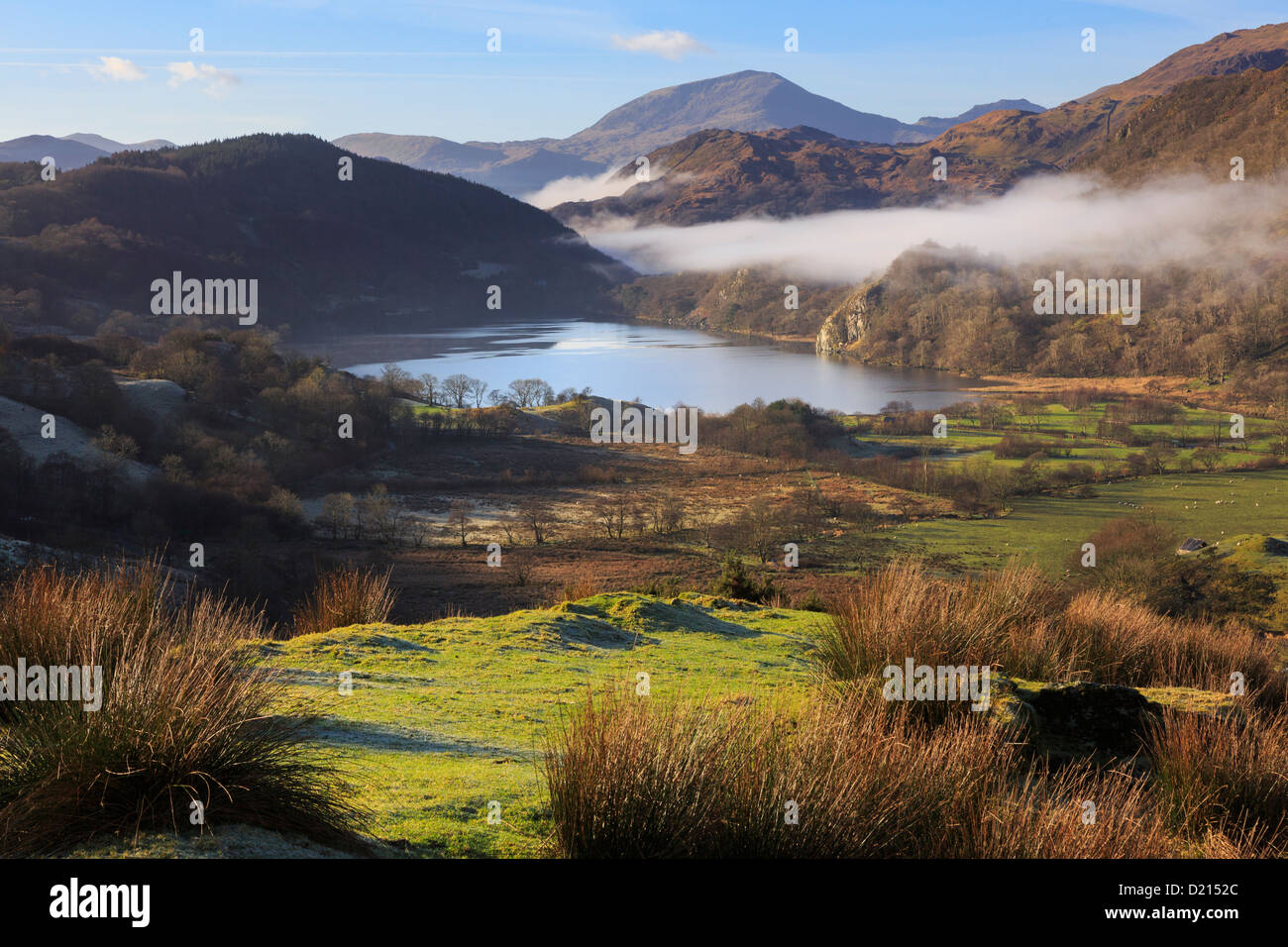 Snowdonia landscape scenic view along Nantgwynant to Llyn Gwynant lake with morning mist in mountains of Snowdonia National Park Wales UK Britain Stock Photo