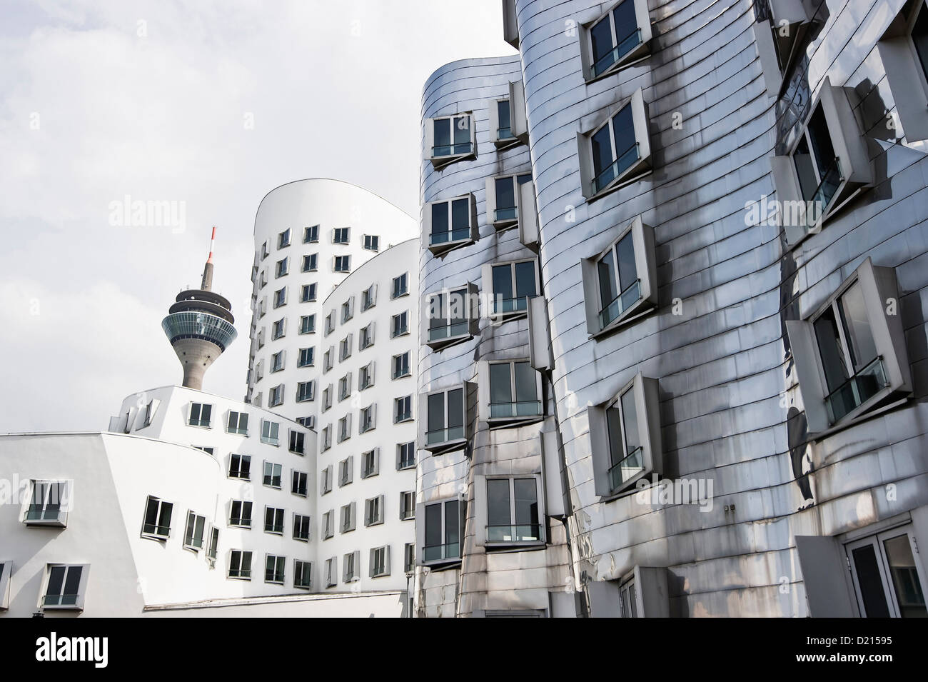 Television tower and buildings designed by Frank Gehry, Duesseldorf, North Rhine-Westphalia, Germany, Europe Stock Photo