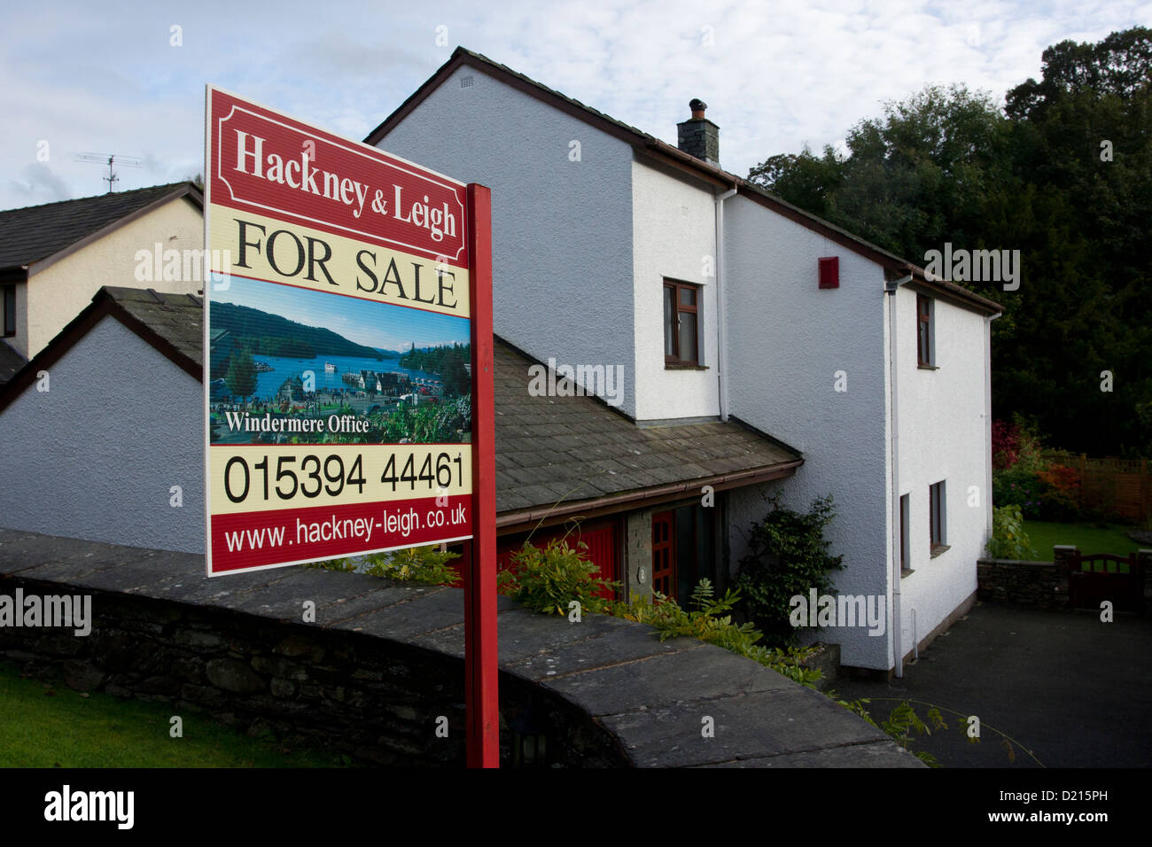 Hackney & Leigh estate agents agent for sale sign outside detached