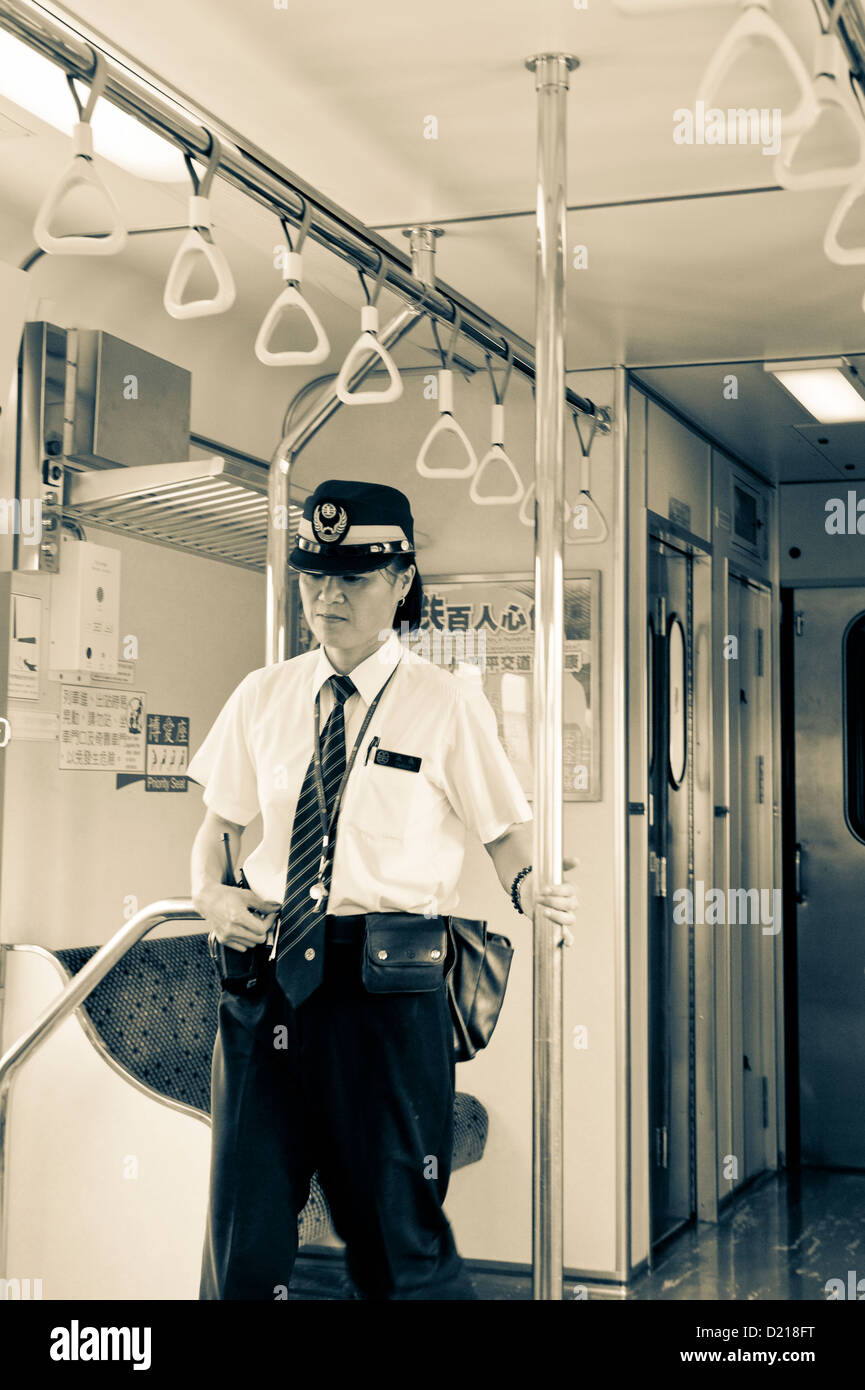 Ticket inspector, Taiwan Stock Photo