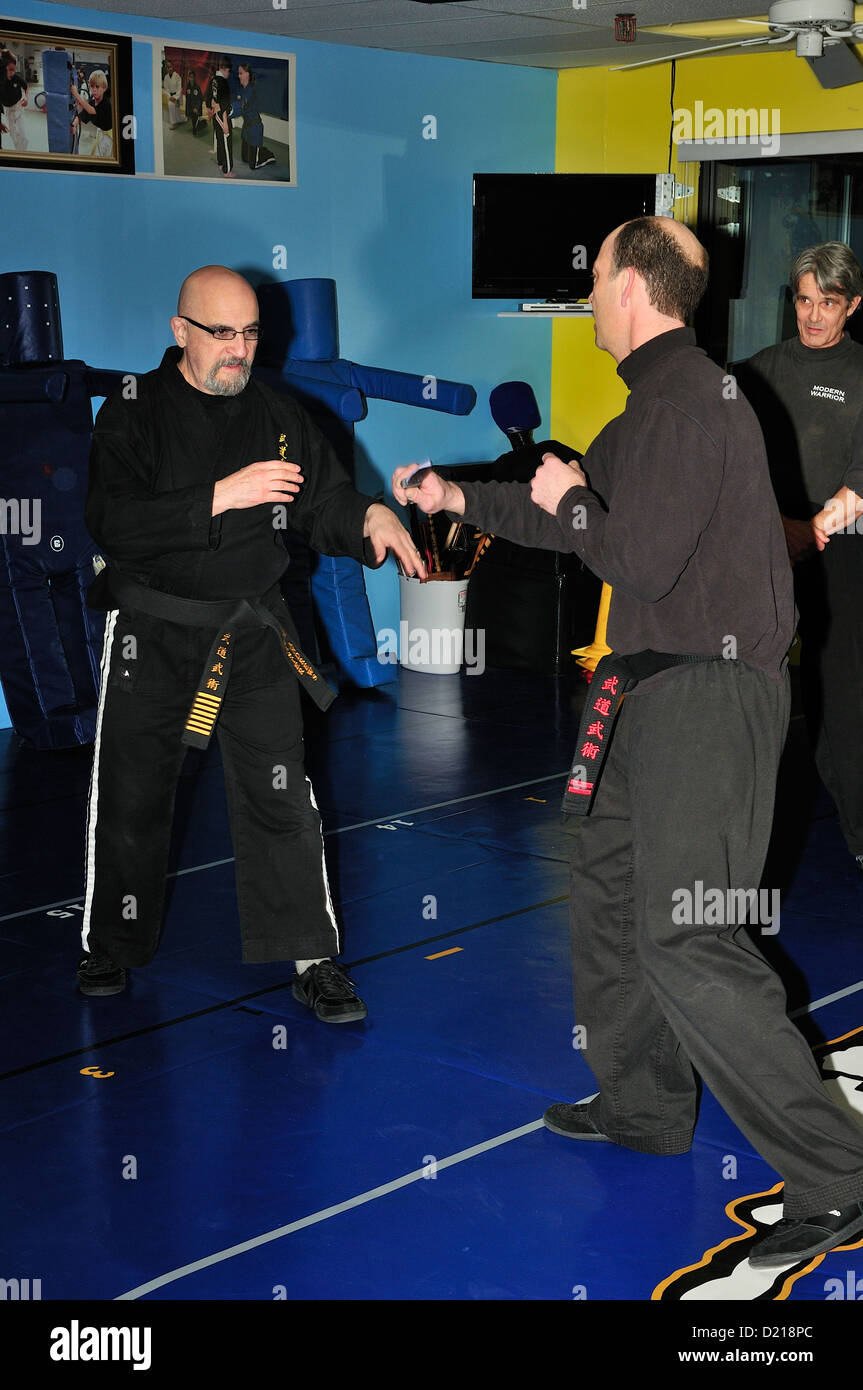 Instructor and student practice filipino escrima stick fighting technique. Martial  arts demonstration Stock Photo - Alamy