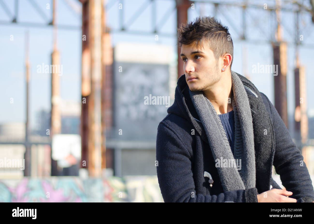 Handsome young man in urban environment, large copy-space Stock Photo