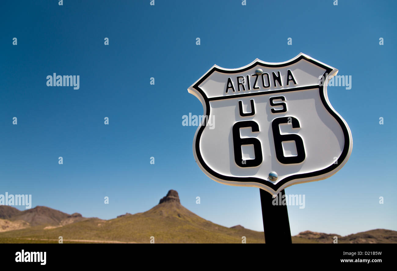 A scenic view of a historic Route 66 sign with a sky blue background Stock Photo